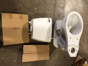 Delta Foundations 2-Piece 1.28 GPF Single Flush Round Toilet in White  Customer Returns See Pictures