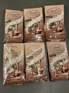 lot 27 image: Lindt Lindor Fudge Swirl Milk Chocolate Truffles - 6 Packs
