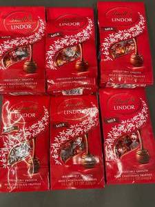 lot 29 image: Lindt Lindor Milk Chocolate Truffles - Lot of 6 Bags