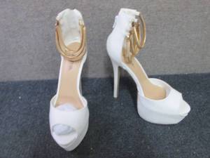 lot 12 image: NIB Judy High White Pumps Size 9...