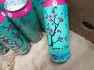 lot 292 image: 14- 22 oz Arizona Green Tea with Gi...