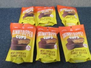 lot 398 image: 4- 3.17 oz Skinny Dipped Cups...
