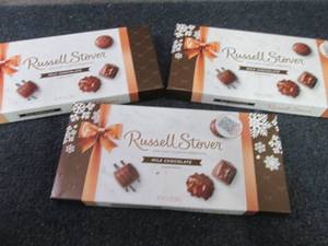 lot 428 image: 3- 9.4 oz Russell Stover Milk Choco...