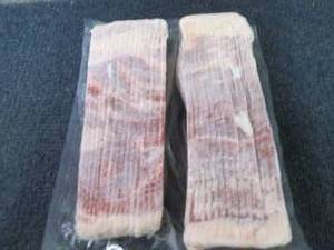 lot 504 image: 2- 1.5 lb pkg FROZEN Hickory Smoked...