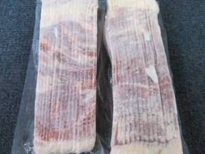 lot 512 image: 2- 1.5 lb pkg FROZEN Hickory Smoked...