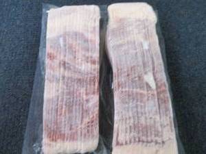 lot 513 image: 2- 1.5 lb pkg FROZEN Hickory Smoked...