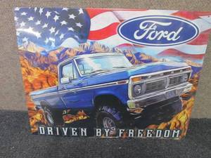 lot 567 image: Metal Ford Sign 12.5x16 inches...