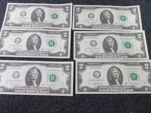 lot 569 image: 6 Sequential Uncirculated $2 Bills...