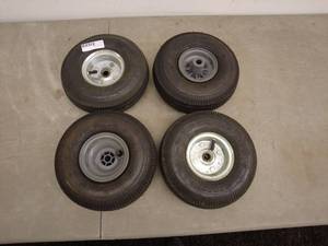 lot 116 image: Lot of 4 Rubber Tires 2metel2plastic rims