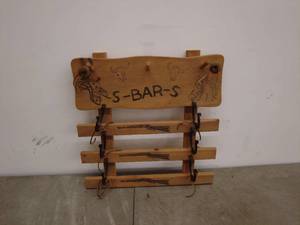 lot 130 image: Vintage Wood Wall Rack with Horse and Longhorn Designs