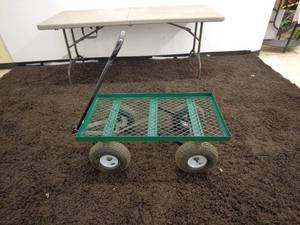 lot 138 image: Green Mesh Garden Utility Cart with Pneumatic Tires