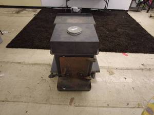 lot 19 image: All Nighter Wood Stove - Vintage Cast Iron Heating Unit