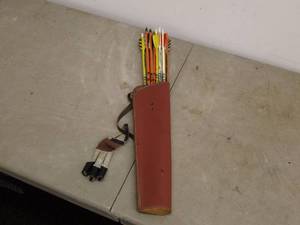 lot 168 image: Vintage Bear Archery Arrows with Leather Quiver - Set of 12