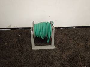 lot 172 image: Green Garden Hose with Portable Hose Reel