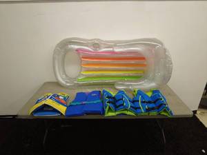 lot 179 image: Lot of Adult and Youth Life Jackets and Inflatable Lounger