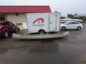lot 30 image: Vintage Aluminum Canoe