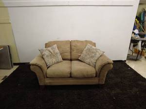 lot 201 image: Tan Loveseat Sofa with Patterned Accent Pillows
