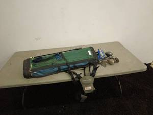 lot 214 image: TaylorMade Golf Bag with Assorted Adams Tight Lies Golf Clubs