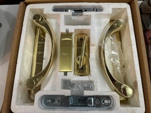 Two New in Box Gliding Door Hardware (Brass and Brushed Nickel)