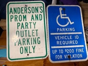 Metal Handicap Sing and Metal Prom Sign.