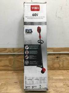 lot 57 image: Lightly Used Toro 60V MAX 13 in.  15 in. Brushless String Trimmer with 2.0Ah Battery And Charger Model # 51831