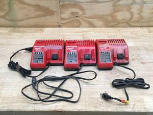 lot 58 image: Lot of 3 - Used Milwaukee M12M18 Charger Model # 48-59-1812