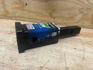 lot 107 image: REESE TOWERPOWER 1-14-in to 2-in Opening Receiver Adapter