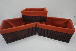 lot 30 image: Three Decor Baskets