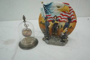 lot 44 image: Home Decor  United We Stand Statue & a Signed Watch Hanging In Globe