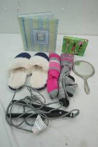 lot 53 image: Slippers, Lotion, Straightener, hand mirror and baby photo book