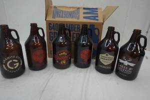 lot 75 image: Six Amber Growlers