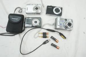 lot 84 image: Four Cameras