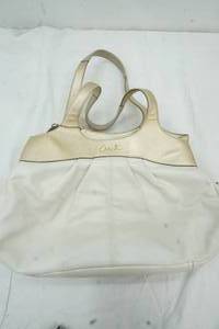 lot 111 image: Coach WhiteGold Purse
