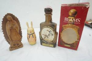 lot 118 image: Vintage Beams Liquor Decanter, Hand carved religious figure and wood rabbit