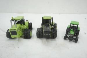 lot 165 image: Three Toy Steiger Tractors