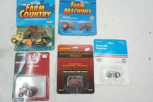 lot 170 image: Five New ERTL Replica Tractors