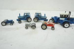 lot 183 image: Collectable Mini Ford Tractors