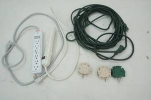 lot 246 image: Garage Items , Green exstetion cord, Plug in adapters, Two Surge arrest 6 outlet 6ft cord 12V