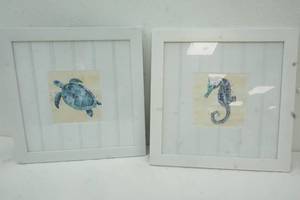 lot 292 image: Ocean decor with white frames and mat