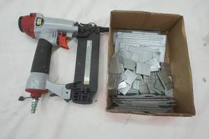 lot 315 image: Central Pneumatic Air Nail Gun with Nails
