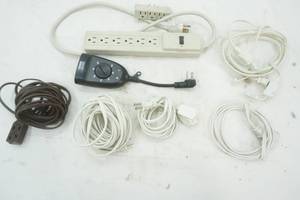 lot 399 image: Extension Cords, Surge Bar, and adapter, timer
