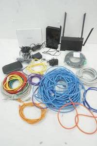 lot 403 image: Ethernet cables and Variety of Net gear Routers
