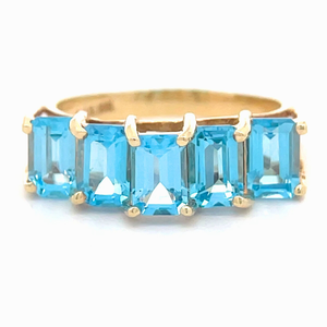 Emerald Cut Blue Topaz Five-Stone Ring in Yellow Gold