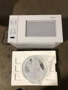 lot 4 image: Vissani 1.1 cu. ft. Countertop Microwave Oven in White Customer Returns See Pictures