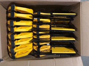 lot 8 image: Case of 4 DEWALT Medium and Large Trigger Clamp (4 Pack) Customer Returns See Pictures