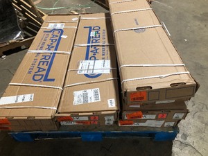 lot 22 image: 8 Boxes of Cap A Tread Sterling Oak 47 in. L x 12.15 in. W x 1.69 in. T Vinyl Stair Tread and Reversible Riser Kit    Customer Returns See Pictures