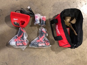 lot 33 image: Milwaukee M12 12V Lithium-Ion Cordless Drill DriverImpact Driver Combo Kit with Two 1.5Ah Batteries, Charger and Bag (2-Tool)  Customer Returns See Pictures