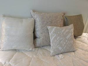 lot 25 image: 3 Designer fabric covers and down filled Cushion inserts  Donna Karen Home and Michael Aram