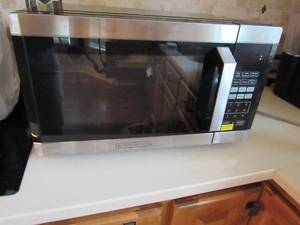 lot 171 image: Nearly New, in the original box counter top Microwave oven