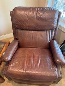 lot 244 image: Next to new Leather recliner with side pocket   Barcalounger